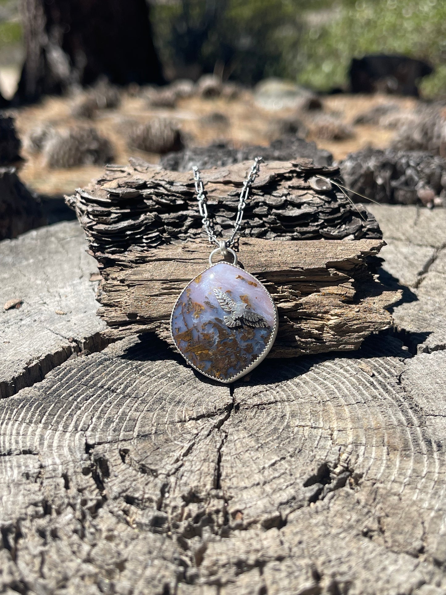 Hawk and Wildflower Pendant